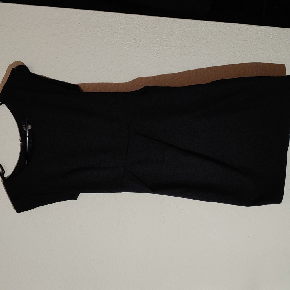 Emilio size 8 little black dress. Perfect for the holidays.
